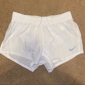 White Nike shorts
